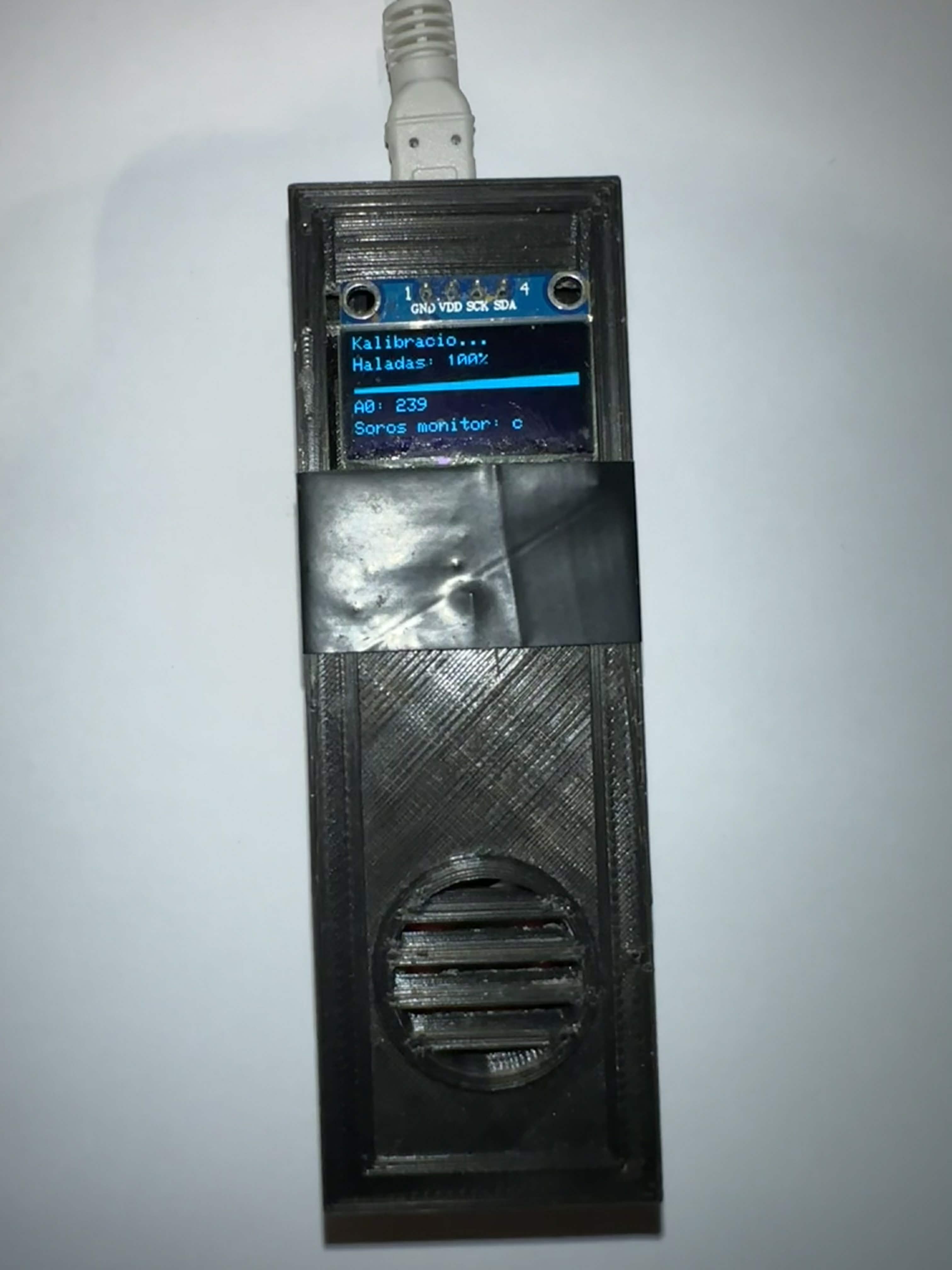 OLED calibration screen with progress indicator